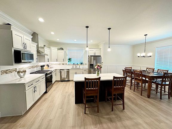 Kitchen, island and dining