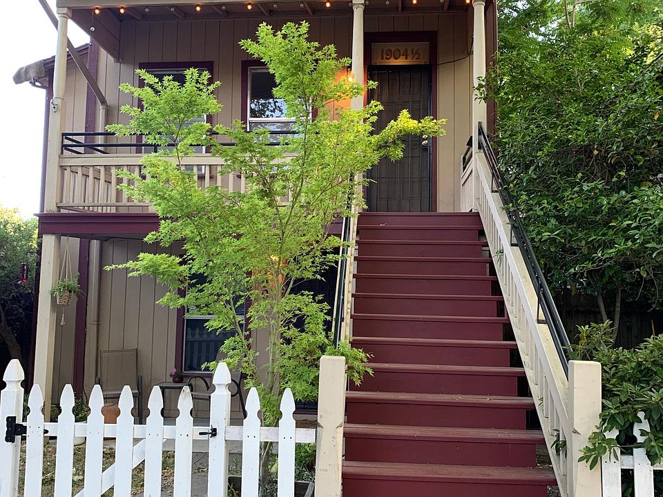 Unit is the upper two floors of this duplex with a large private deck, shared back yard and parking.