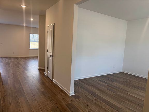 Versatile flex space off the entryway, perfect for use as a home office, formal dining room, or play area.