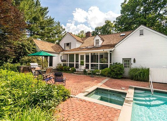Rogers pool with hot tub and back of house.jpg