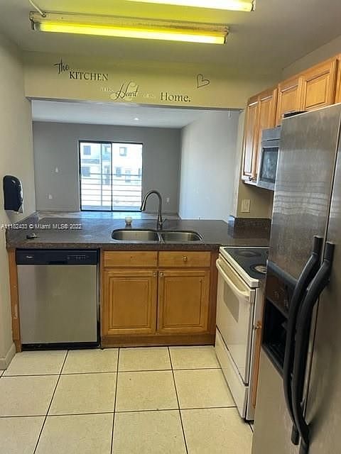 1st image of 911 NE 209th Ter APT 201-27
