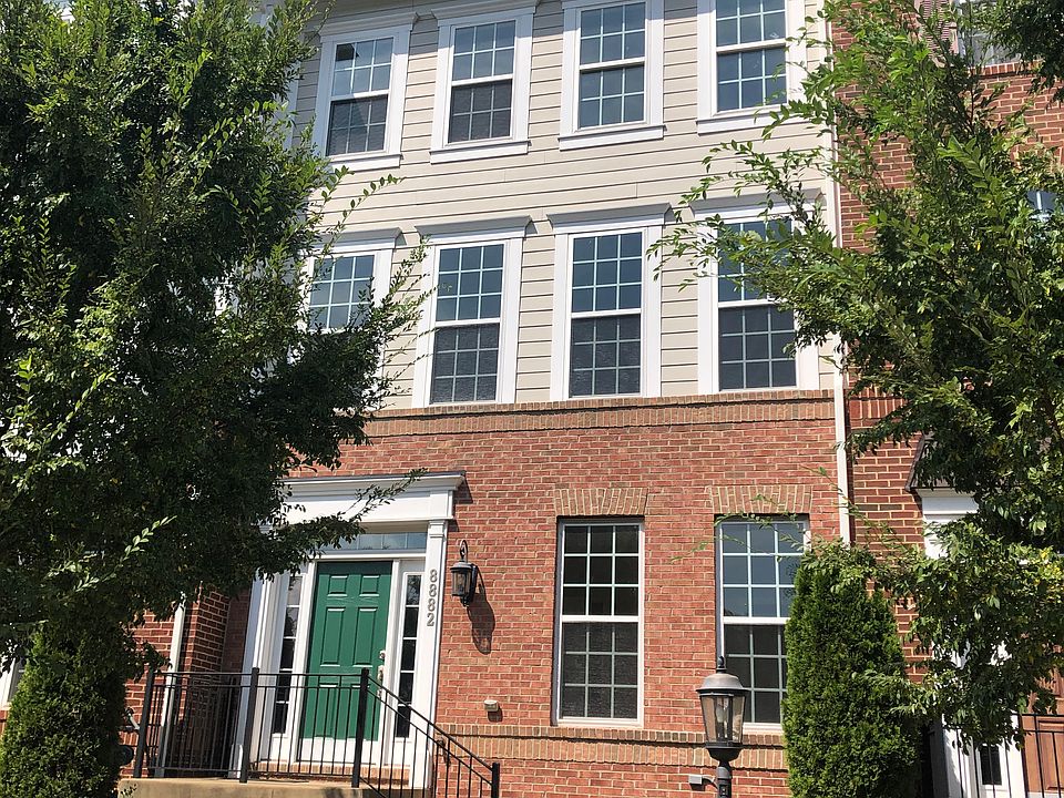 The front of the townhouse; unit is third from the left