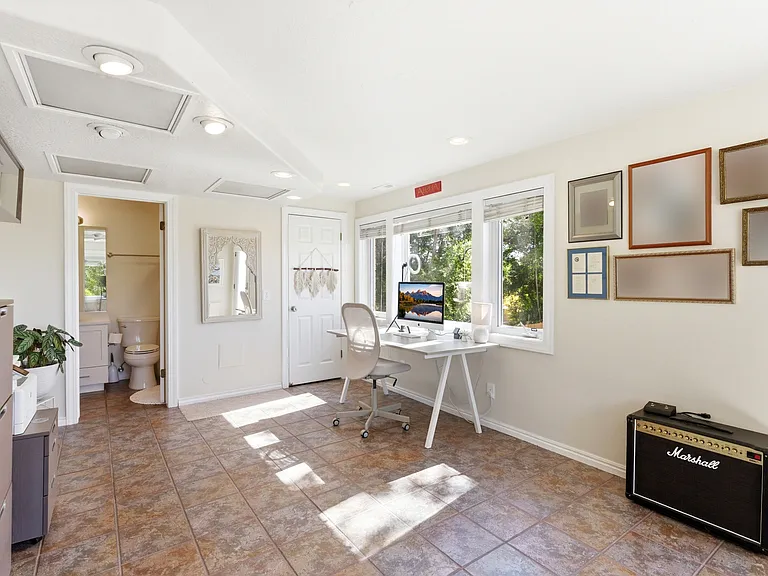 Versatile office or flex space with a private entrance. Ideal for remote work or hobbies.