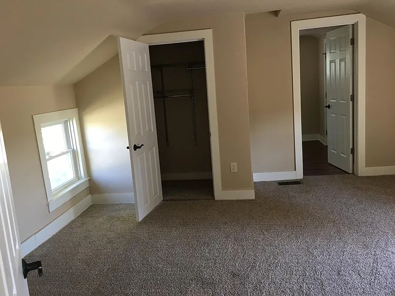 Bedroom closets all with adjustable hanging and shelves