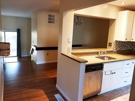 Looking into dining room, living room from front hallway
