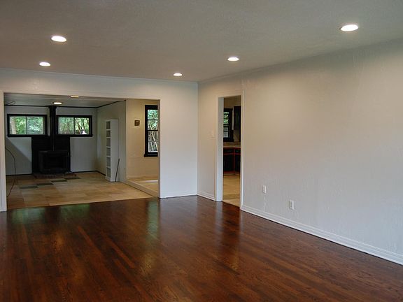 Living Area with newly refinished hardwoods.