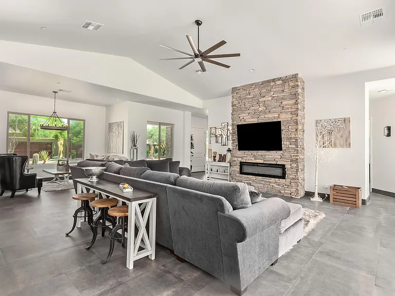 GREAT ROOM. MASTER BEDROOM TO THE RIGHT. GUEST/OFFICE TO THE LEFT AND THE OTHER TWO BEDROOMS DOWN THE WEST SING.
