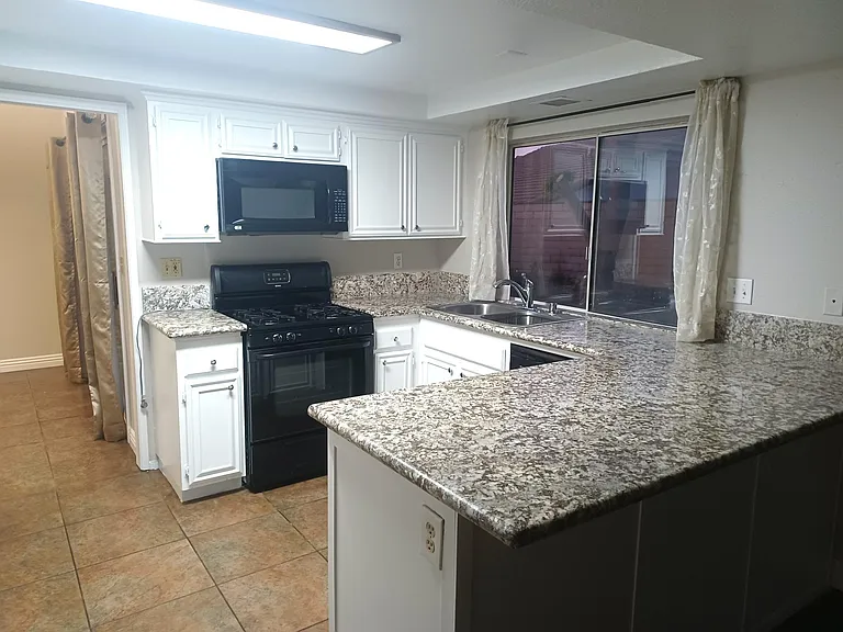 7048 Westport St — Photo 4