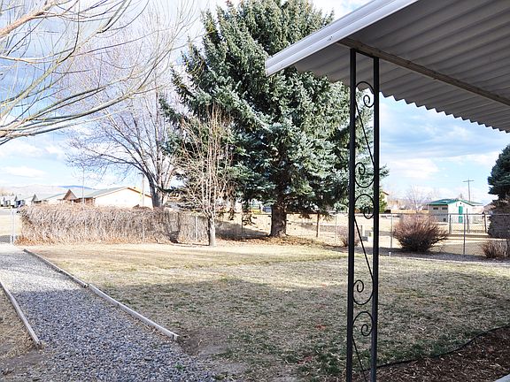 backyard opens to green belt