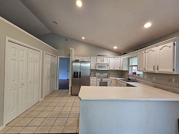 Kitchen Leading into Primary Bedroom