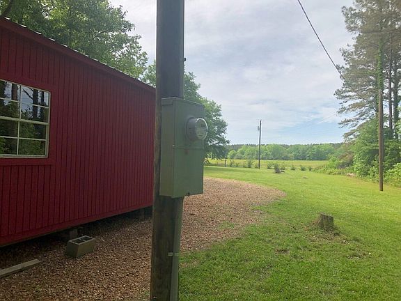 Camphouse facing CR 3224, the south property boundary