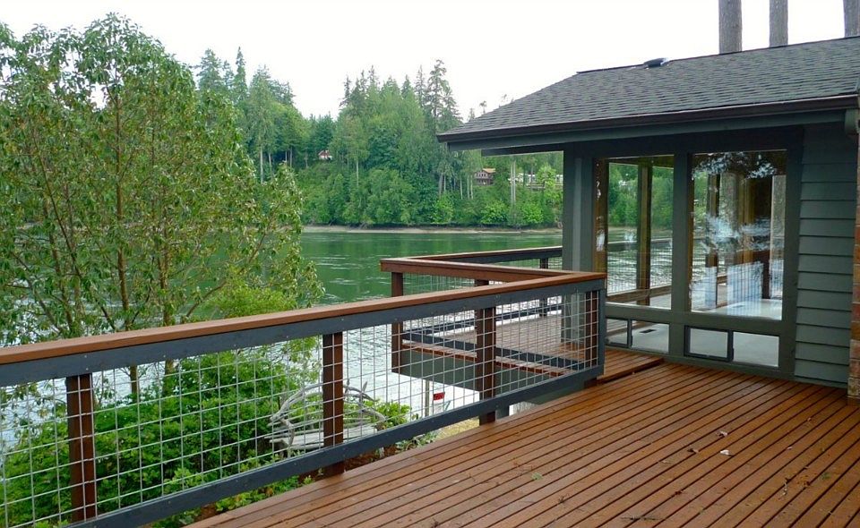 Beautifully refinished home sits next to Hammersley Inlet.