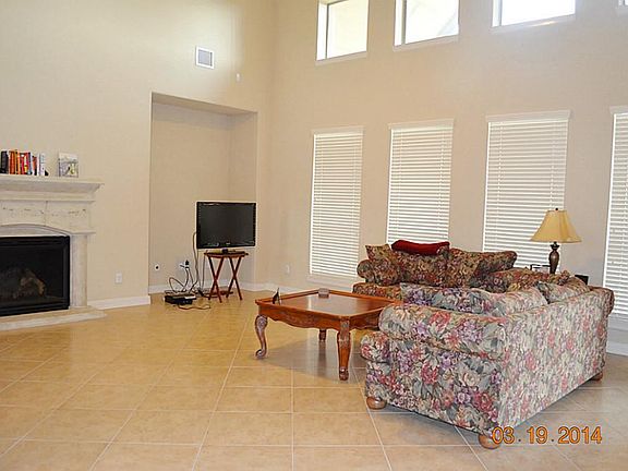 Spacious family room with fireplace.