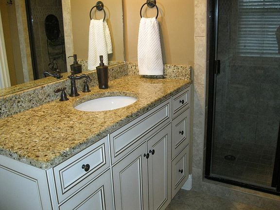 Granite countertops, tiled floors
