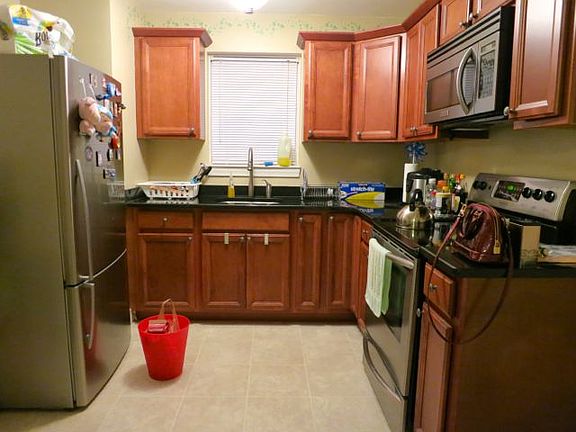 Kitchen w/ Granite Counter and Stainless Appliances