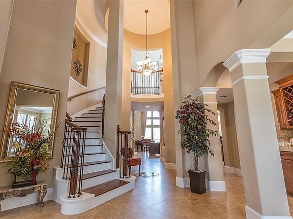 When you enter this beautiful home you will see the sweeping wood stairs, the 8" baseboards, the Butler's Pantry.  It is breathtaking.