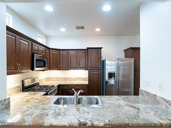5th image of 9570 Compass Point Dr S Unit 4