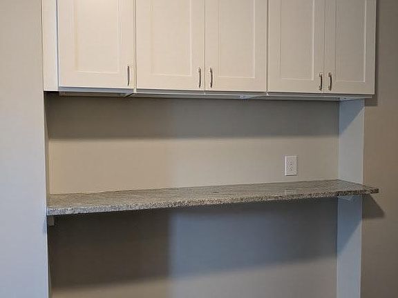 Tons of Kitchen Storage & Long Breakfast Bar