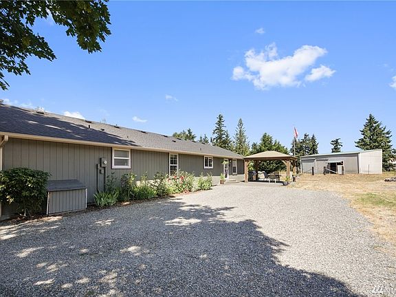 Home boasts AC, generator ready, newer gazebo and a hot tub
