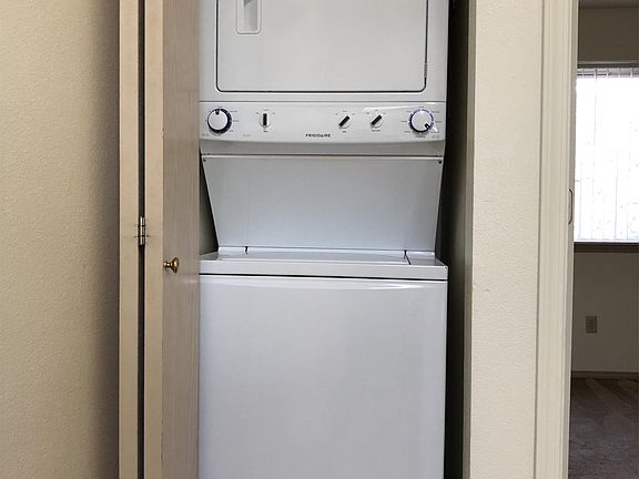 Stacked washer / dryer in unit!