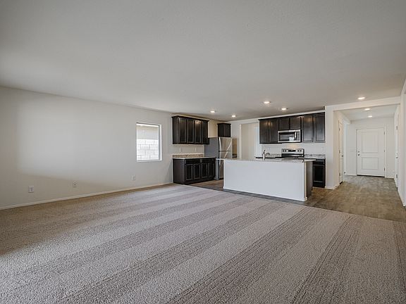 Open living area leading to the kitchen.