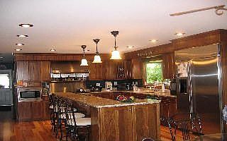 New Custom Kitchen with granite, stainless, hardwood flooring.