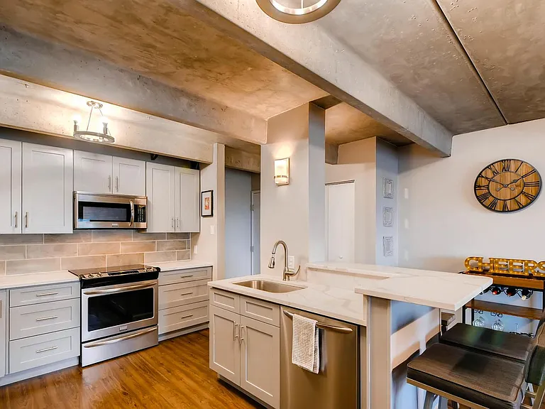 New microwave, stove, dishwasher, and fridge.