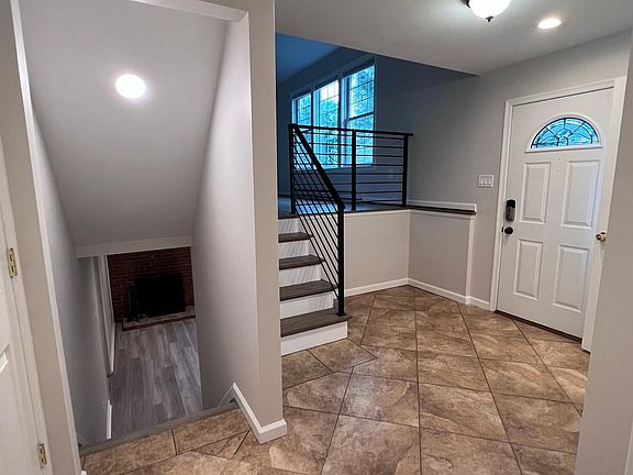 entrance hall with basement staiway