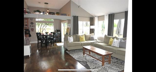 Open concept living room, dining room, kitchen area