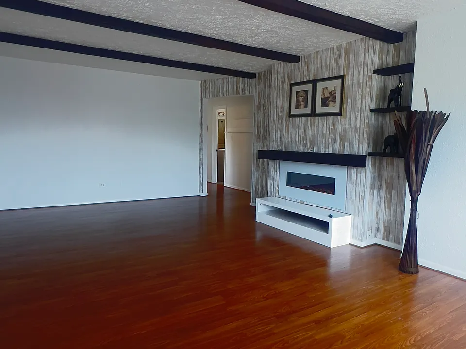 specious living room, build in fire place