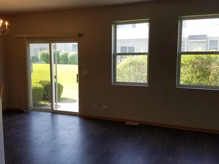 dining and living room facing back yard