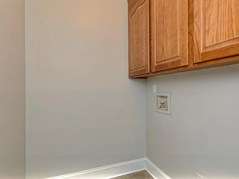 laundry room off the kitchen by the garage