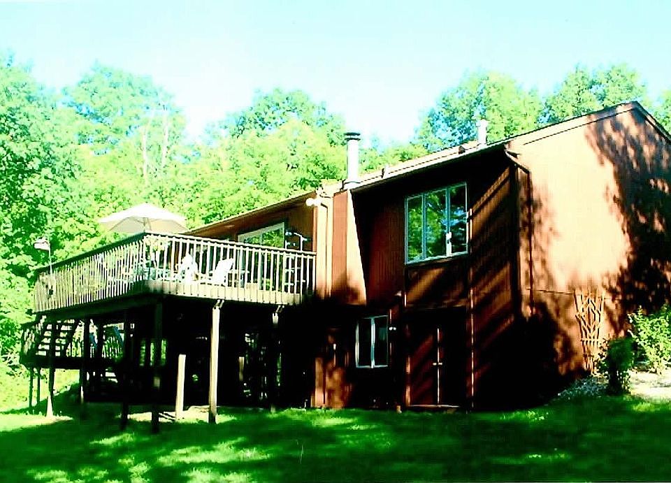 Back of house large deck overlooking yard
