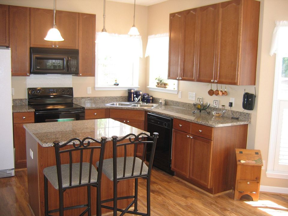 Updated Kitchen with Granite, brushed nickel fixtures and hardwood floors