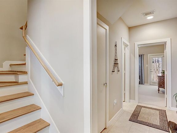 AS YOU ENTER YOU HAVE VIEW OF FOYER AND STAIRCASE WITH OAK TREADS
