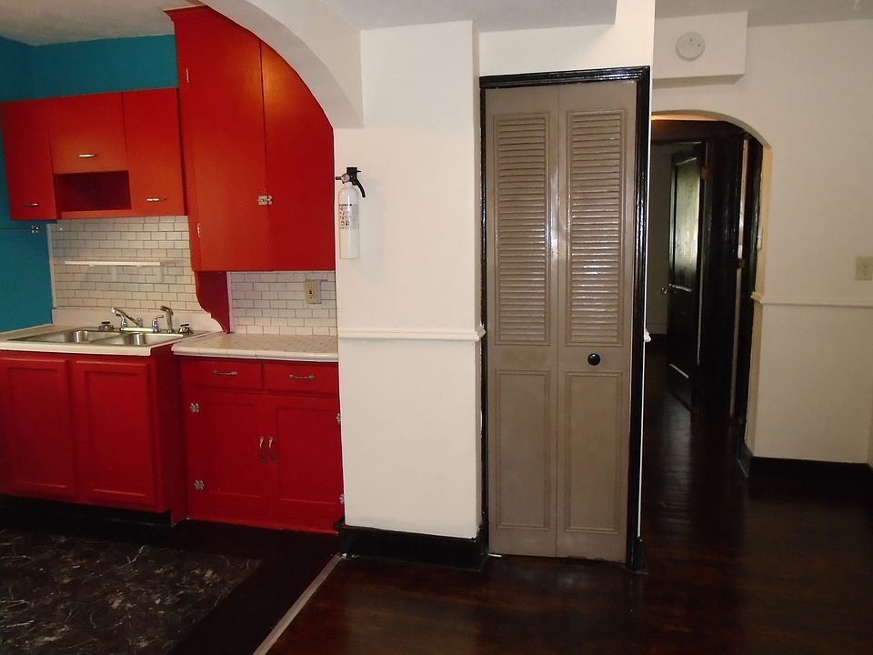 Plenty of kitchen storage. Furnace hidden behind a trifold door.