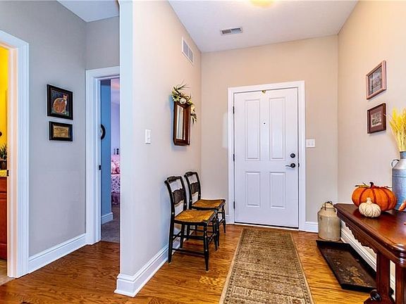 Upgraded Hardwood floors in the open 10x7 foyer and throughout the living area...