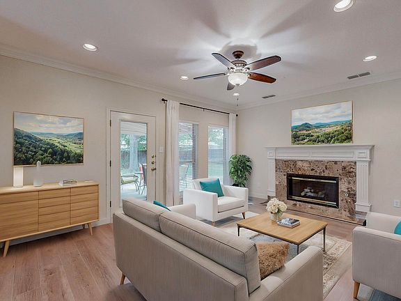 living room with gas fireplace/gas log