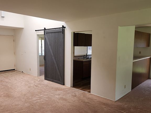 ENTRY TO FORMAL DINING AREA AND KITCHEN