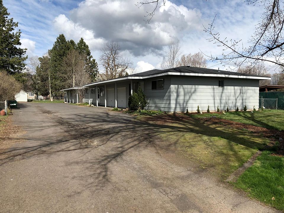 The unit is part of a 4-plex on a 1+ acre lot