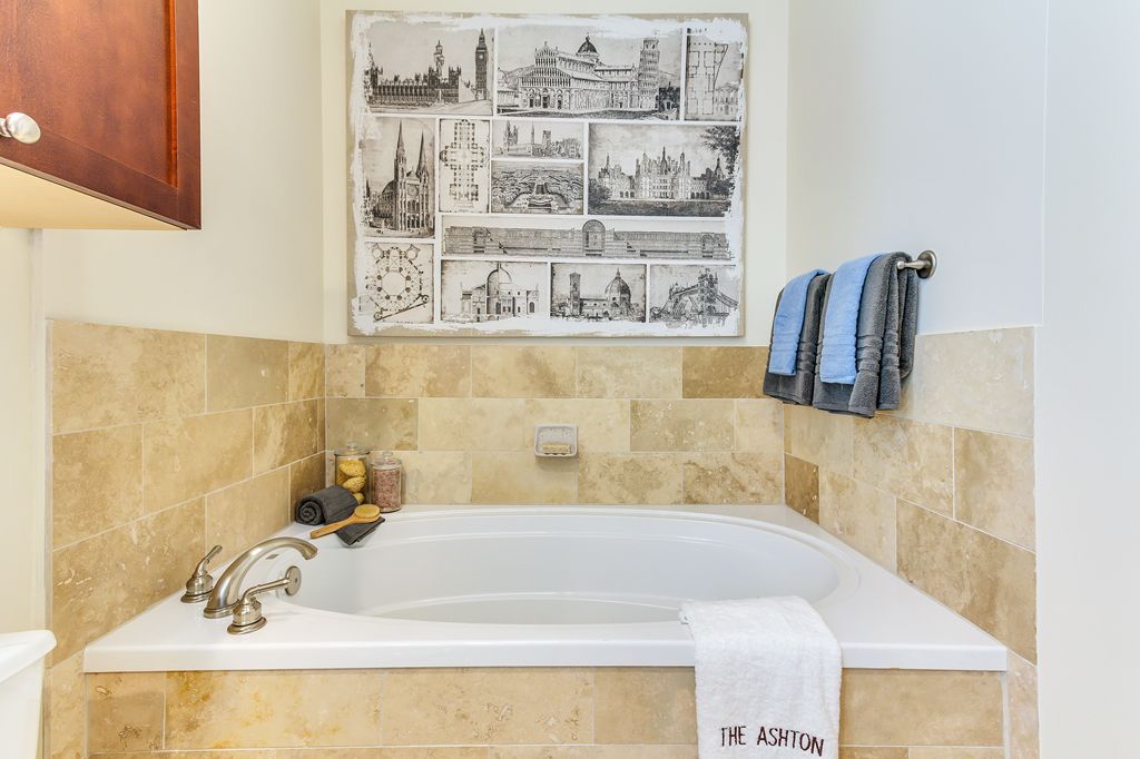 Spa-inspired soaking tub in spacious luxury bathrooms