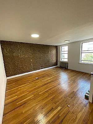 3rd image of 150 E 3rd St APT 4C