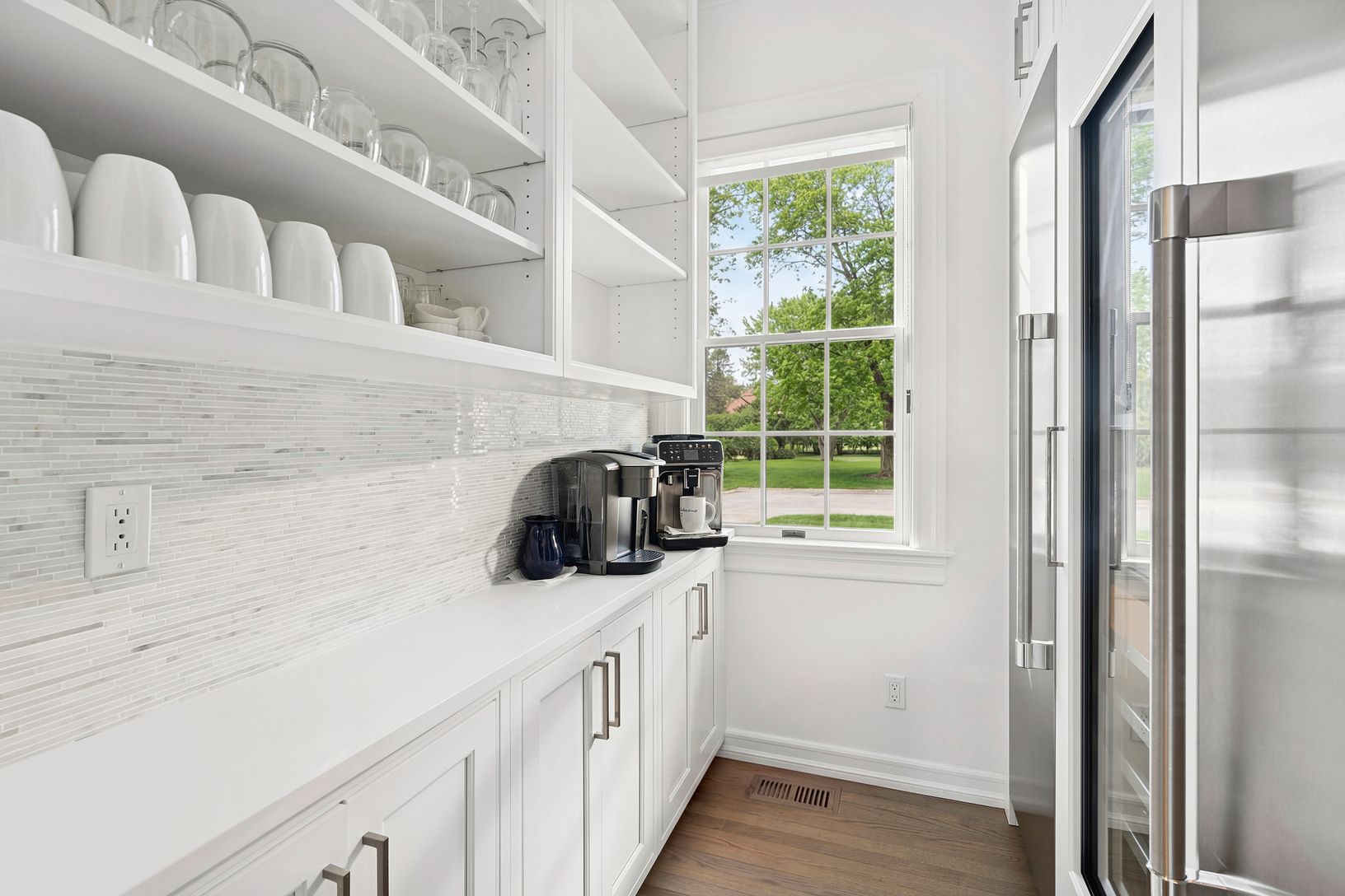 Pantry with additional refrigerator and freezer, full-size wine fridge