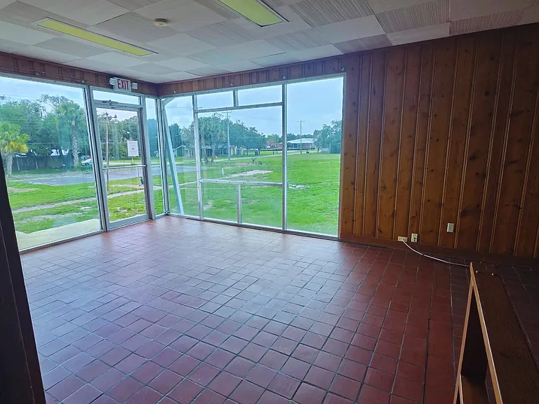 Versatile open room filled with natural light and endless possibilities.