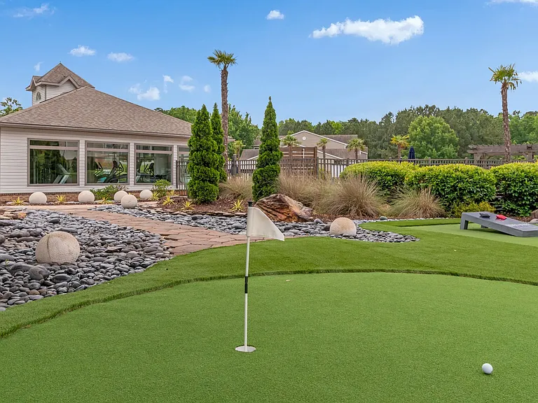 Enjoy solo games or lively matches with neighbors on our picturesque putting green.