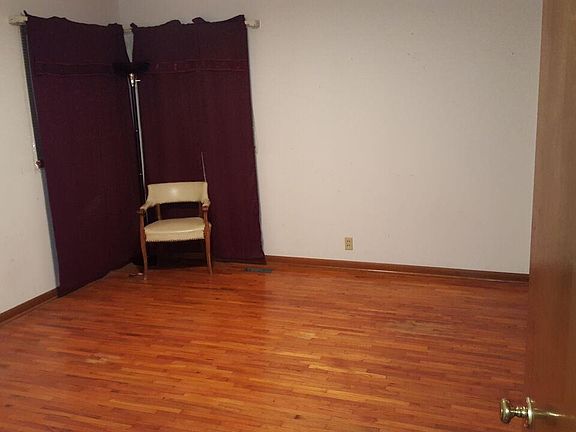 Hardwood floor in master bedroom