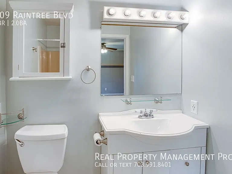 209 Raintree Blvd — Photo 32