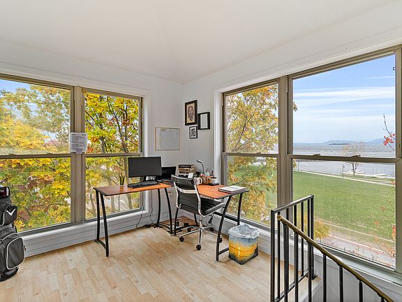 Unique penthouse space accessed through living room offers more sweeping views and can be used as an office or sleeping space