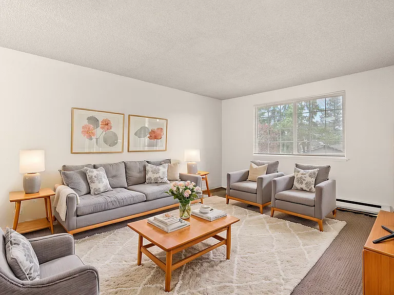 Step into elegance with this inviting living space, beautifully adorned for comfort and style.
