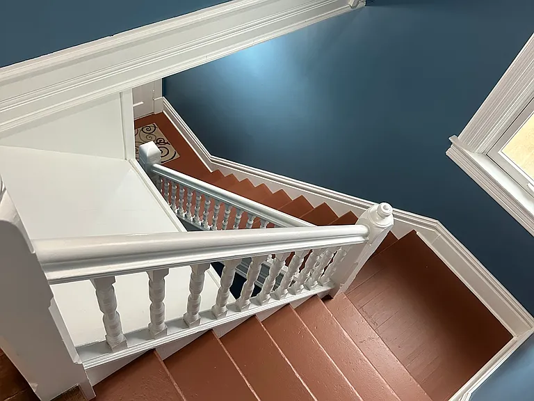 Front stairway. The entire apartment was recently repainted by a historical home painter.